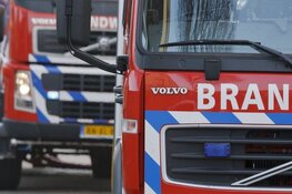 Kliko&#39;s in brand bij bedrijf in Gorredijk