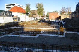 Bouw van woningen en appartementen aan de Nieuwstraat in Heerenveen vordert