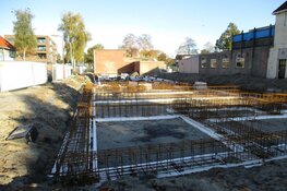 Bouw van woningen en appartementen aan de Nieuwstraat in Heerenveen vordert